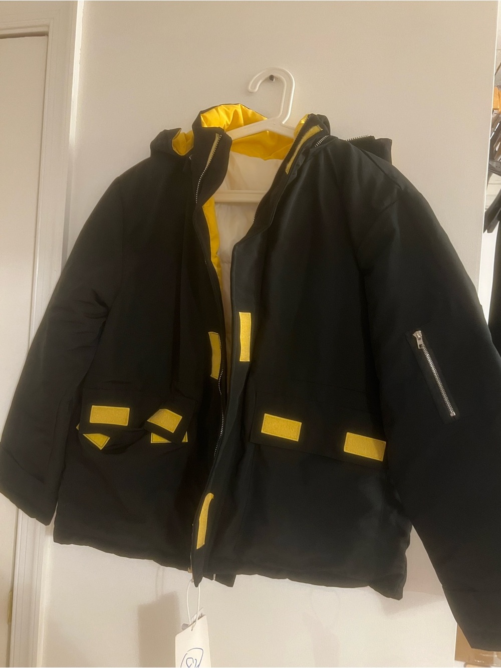 Black Puffer Jacket with Yellow Accents